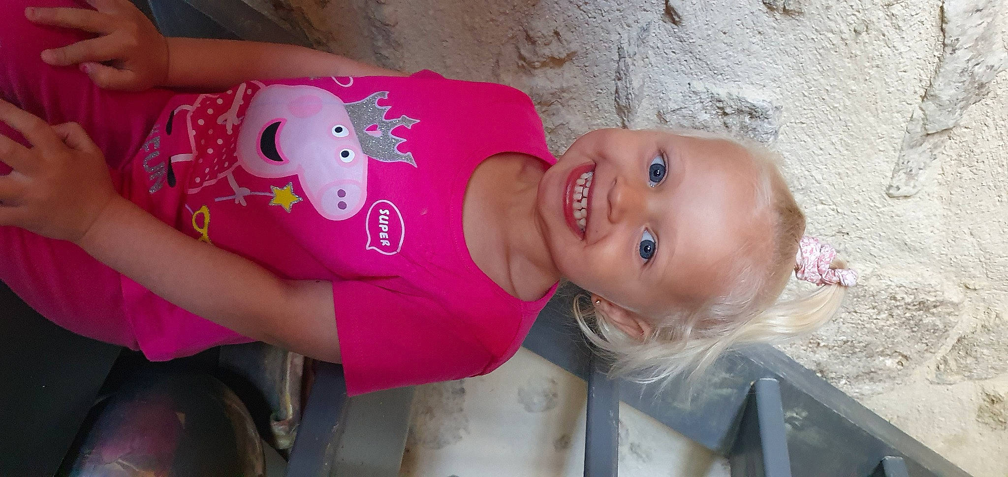 Luna participe au concours pour gagner de l'argent avec cette photo : arm, baby, baby_toddler_clothing, cheek, clothing, facial_expression, happy, hat, head, human_body, joy, lip, mammal, mouth, neck, nose, organ, person, pink, skin