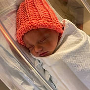 Stetson is registered to the contest to win money with this photo: baby, bassinet, blanket, child, cozy, cute, hat, hospital, indoor, infant, knitted_hat, newborn, pacifier, peaceful, pom_pom, portrait, resting, sleeping, soft, wrapped