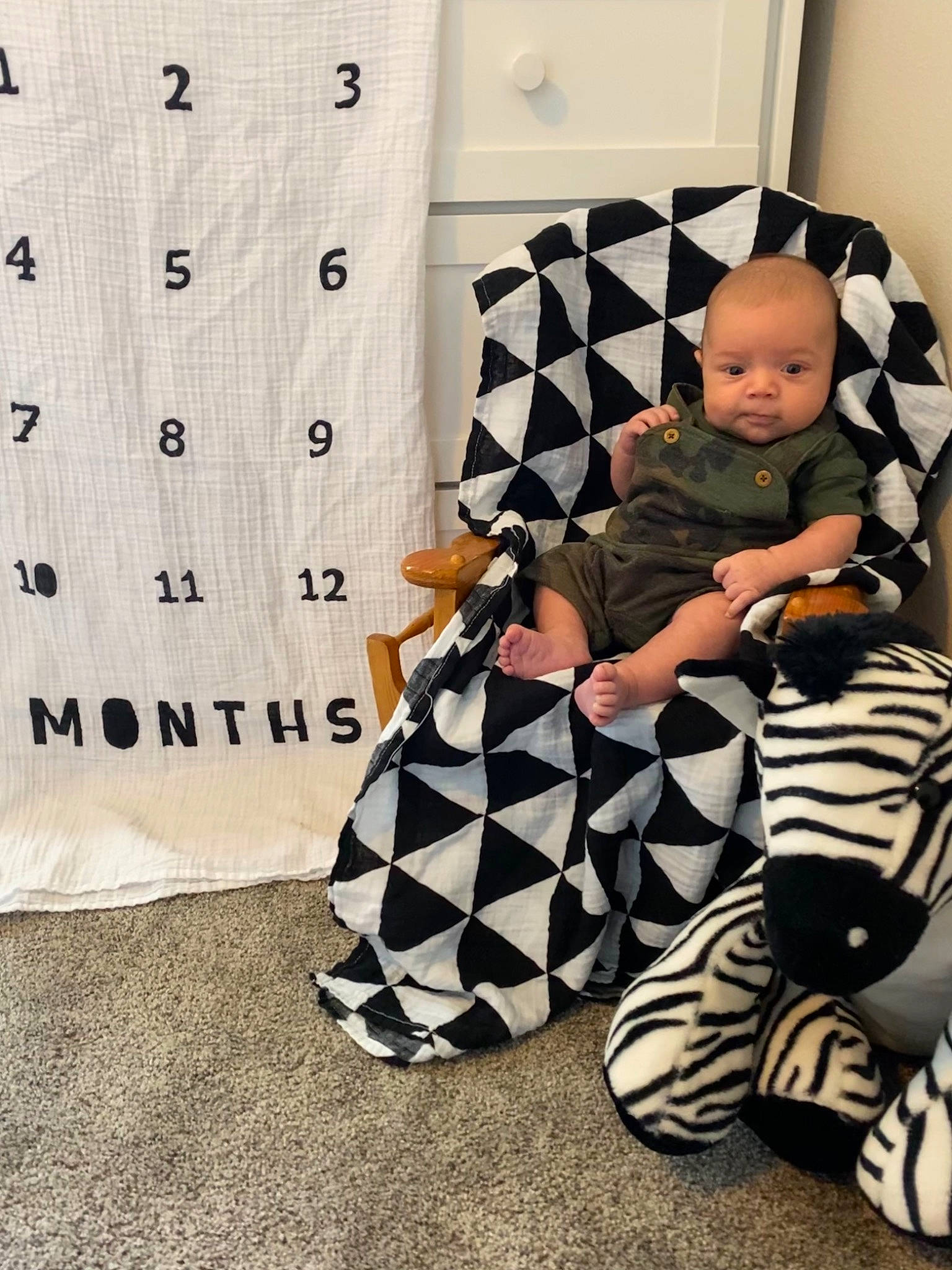 Everest joined the competition — help win amazing prizes! baby_toddler_clothing, boot, chair, child, comfort, curtain, design, floor, flooring, linens, pattern, person, play, room, sitting, sleeve, sock, style, t_shirt, textile