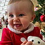 Lina a rejoint le concours — aidez-le/la à gagner de superbes lots ! baby, bear, blue_eyes, celebration, child, christmas_ornament, christmas_tree, cute, face, festive, happy, holiday_decor, indoor, portrait, red_clothing, sitting, smiling, stuffed_animal, toy, winter_clothing