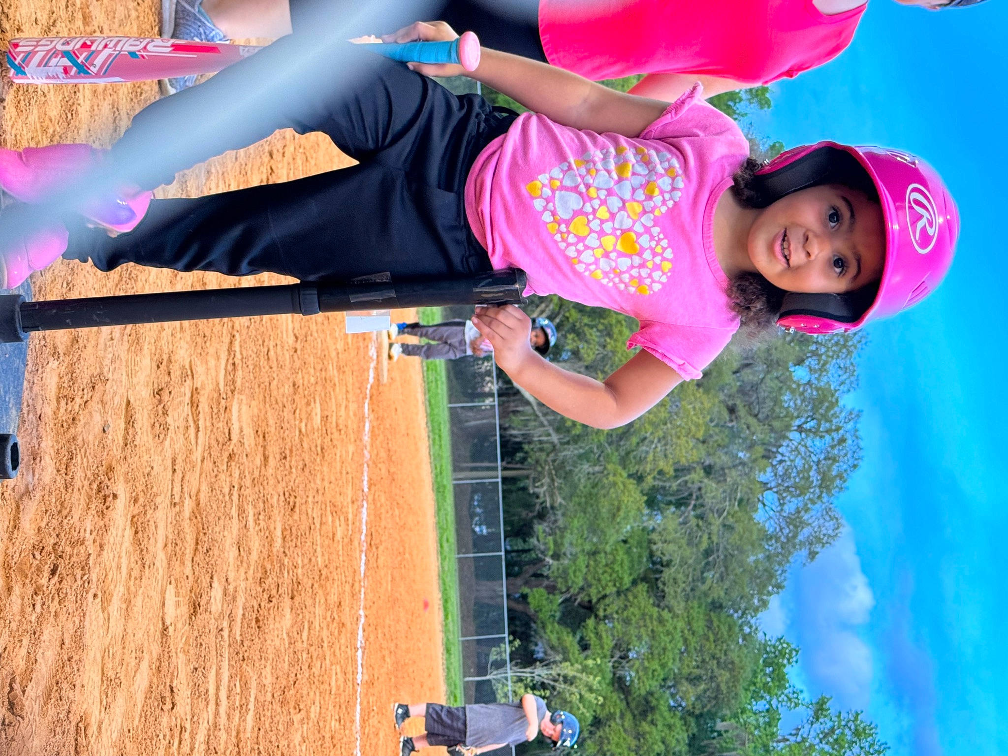 Leilani joined the competition — help win amazing prizes! beauty, entertainment, fun, grass, green, happy, headwear, leisure, light, magenta, people_in_nature, person, photograph, pink, plant, recreation, red, sky, summer, t_shirt