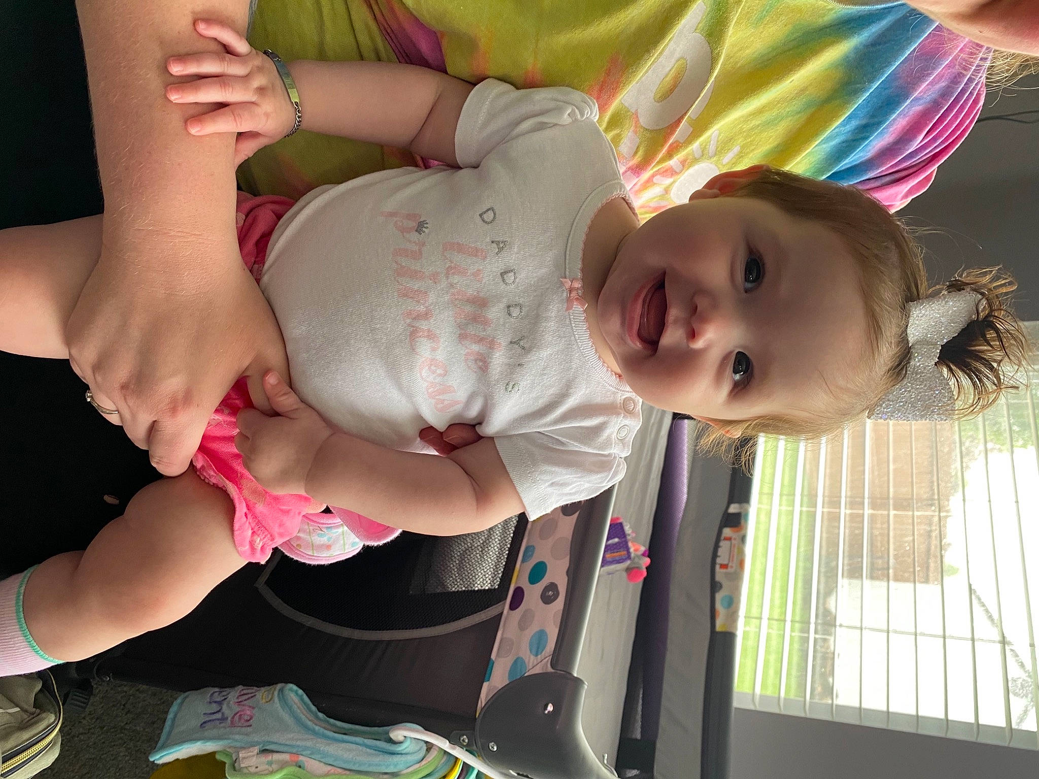 Azalia is registered to the contest to win money with this photo: arm, baby, chest, elbow, eye, finger, fun, gesture, green, happy, joint, joy, leisure, mouth, person, pink, product, skin, smile, thigh