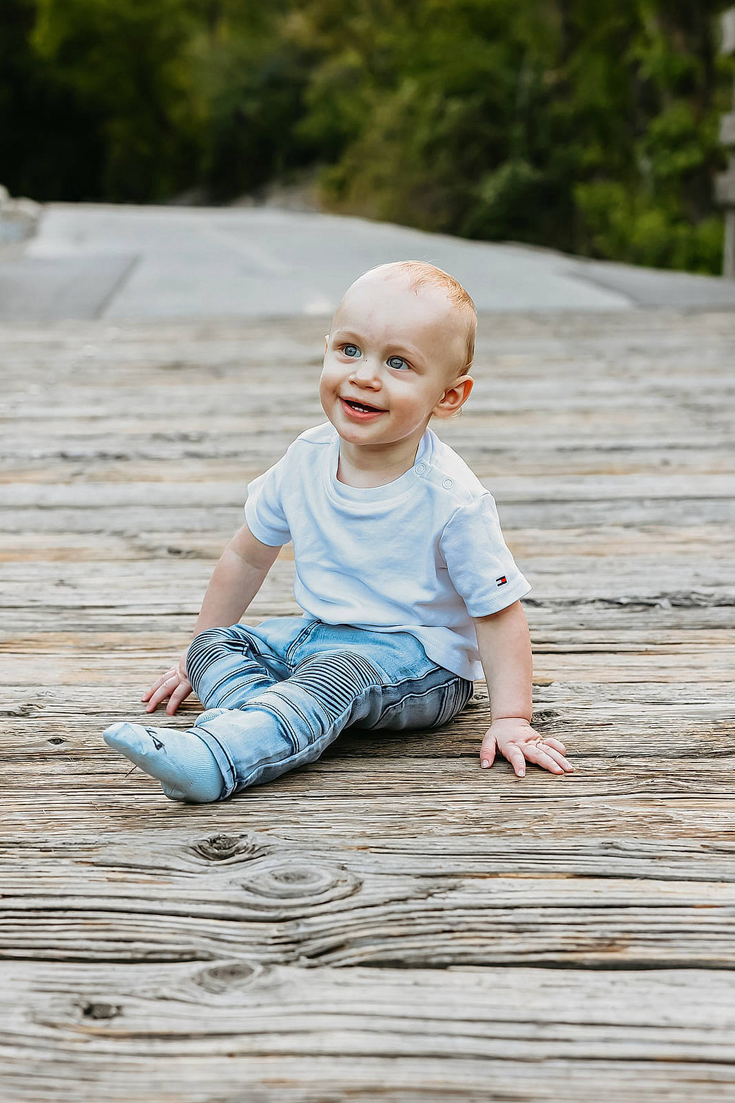 Zedekiah is registered to the contest to win money with this photo: baby_toddler_clothing, child, flooring, grass, happy, hardwood, head, joy, leaf, leisure, people_in_nature, person, plant, shorts, skin, smile, standing, summer, t_shirt, toddler