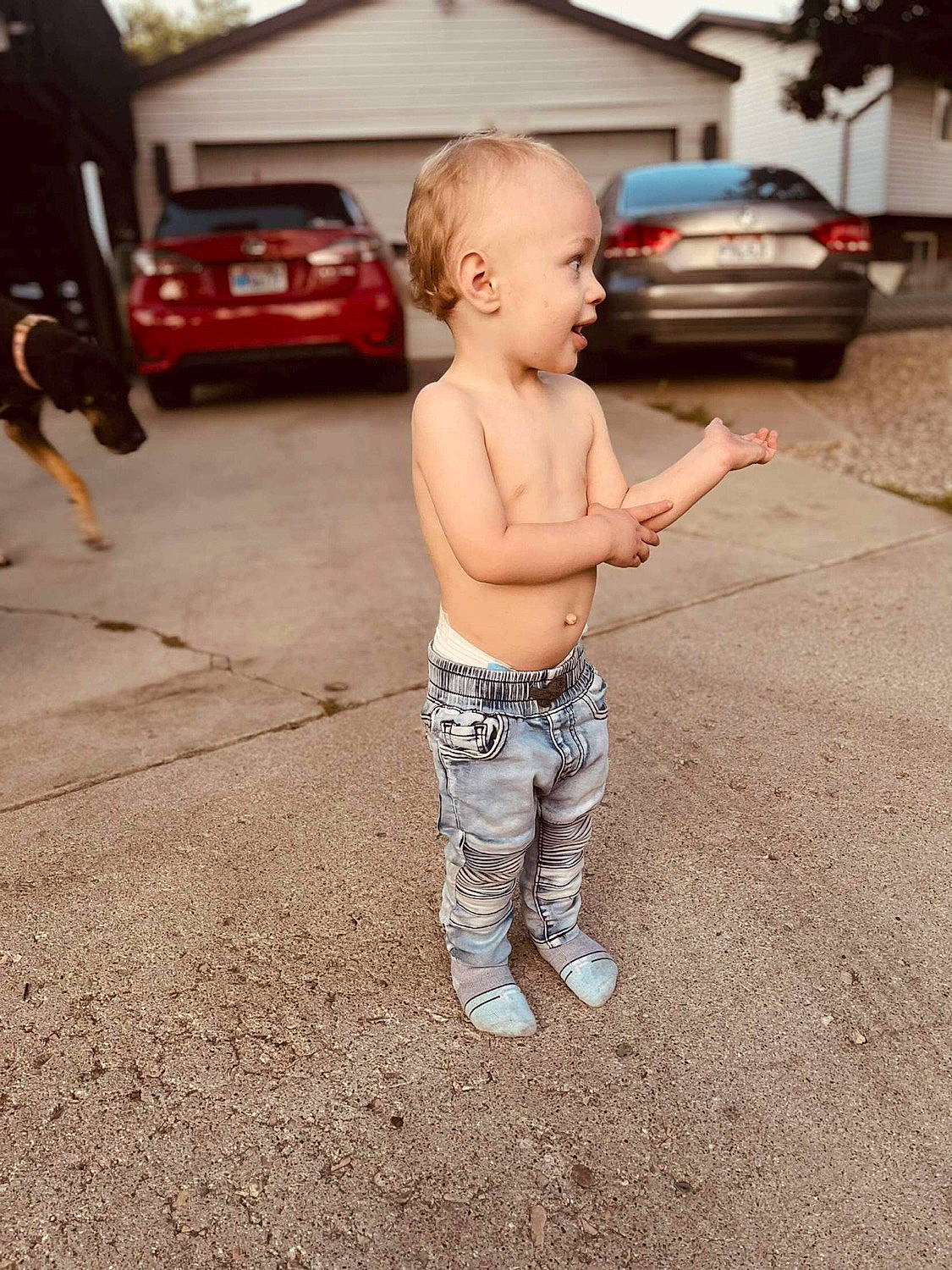 Zedekiah is registered to the contest to win money with this photo: asphalt, automotive_exterior, baby, car, family_car, flooring, fun, grass, happy, human_leg, land_vehicle, person, road, shorts, t_shirt, tire, toddler, tree, vehicle, vehicle_door