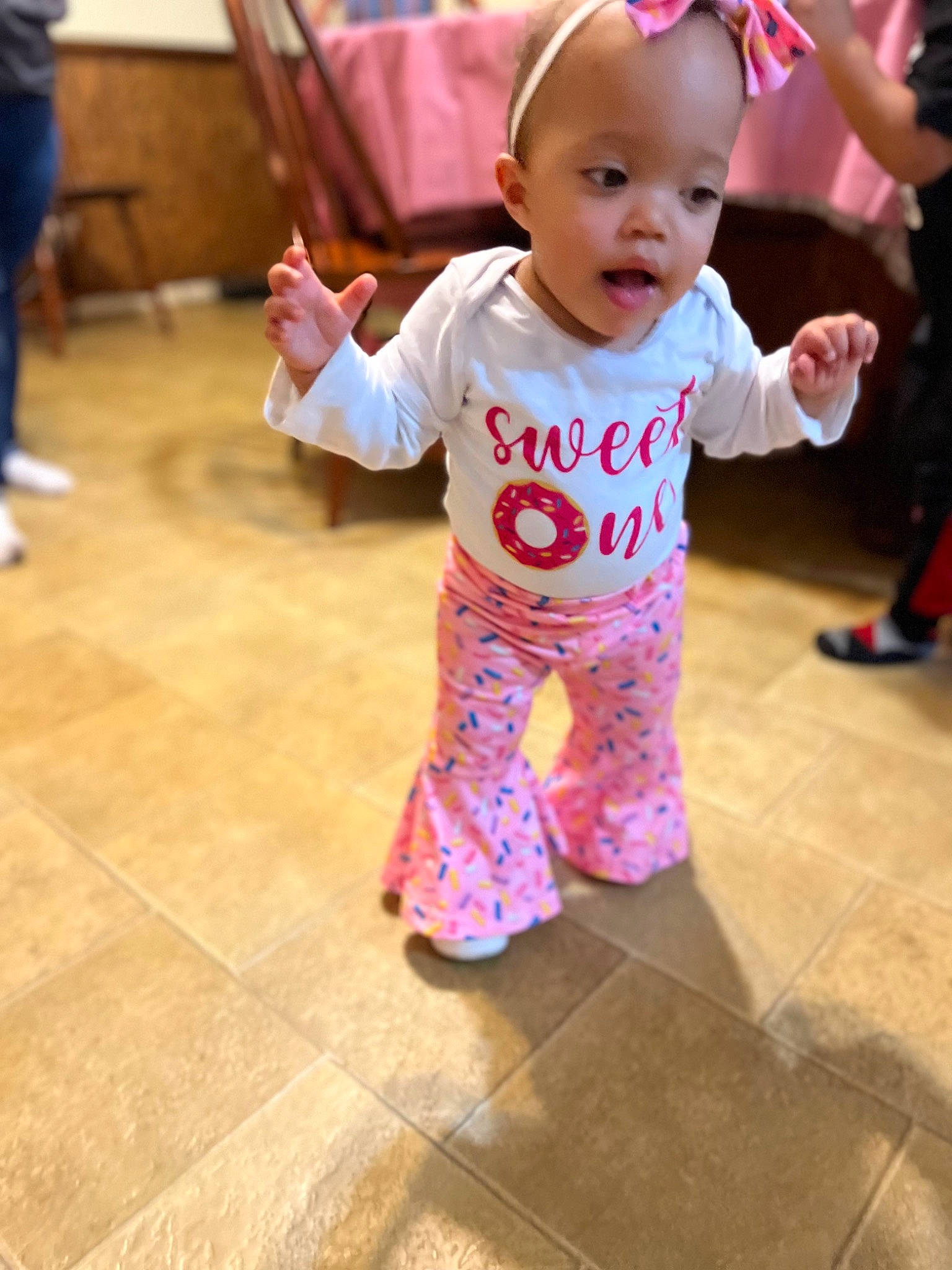 Journee joined the competition — help win amazing prizes! baby, baby_toddler_clothing, cheek, child, event, facial_expression, floor, flooring, foot, fun, happy, hardwood, leisure, person, pink, shoe, skin, sleeve, smile, toddler