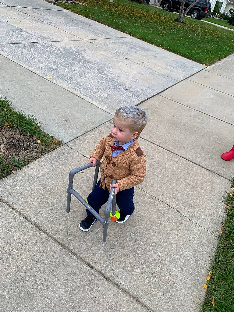 Luke joined the competition — help win amazing prizes! asphalt, baby, baby_products, child, city, driveway, flooring, fun, garden, grass, lawn, leisure, outdoor_furniture, person, plant, recreation, road_surface, sidewalk, sitting, toddler