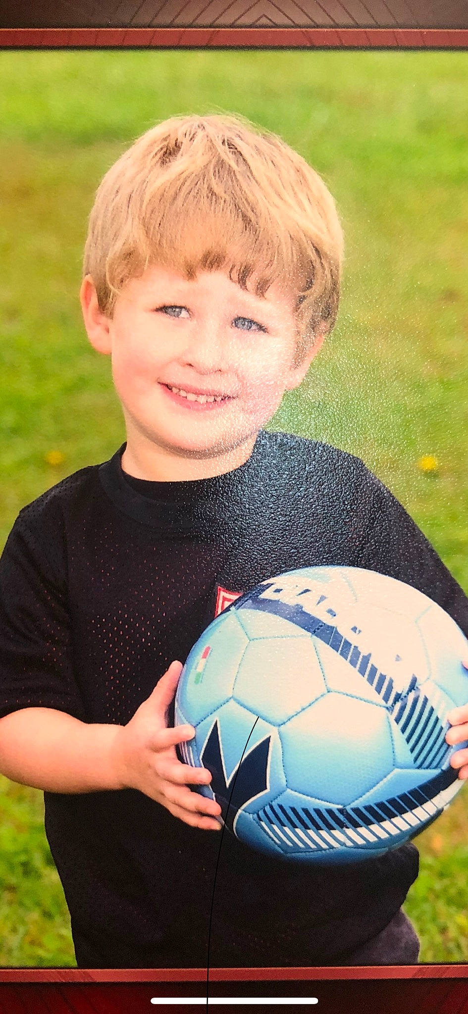 John joined the competition — help win amazing prizes! ball, ball_game, facial_expression, finger, football, fun, grass, happy, joy, leisure, mammal, nature, organ, people, people_in_nature, person, player, playing_sports, smile, soccer