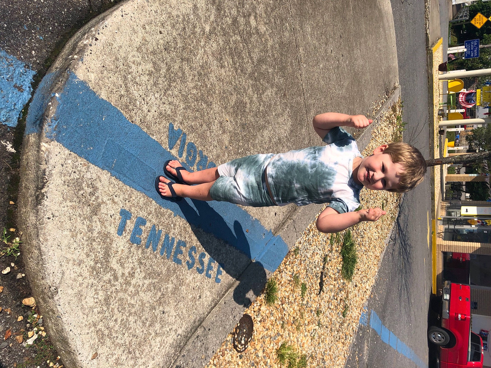 John joined the competition — help win amazing prizes! asphalt, circle, city, concrete, denim, electric_blue, fun, human_leg, joy, leisure, person, public_space, recreation, road, road_surface, shadow, sidewalk, soil, street, street_fashion