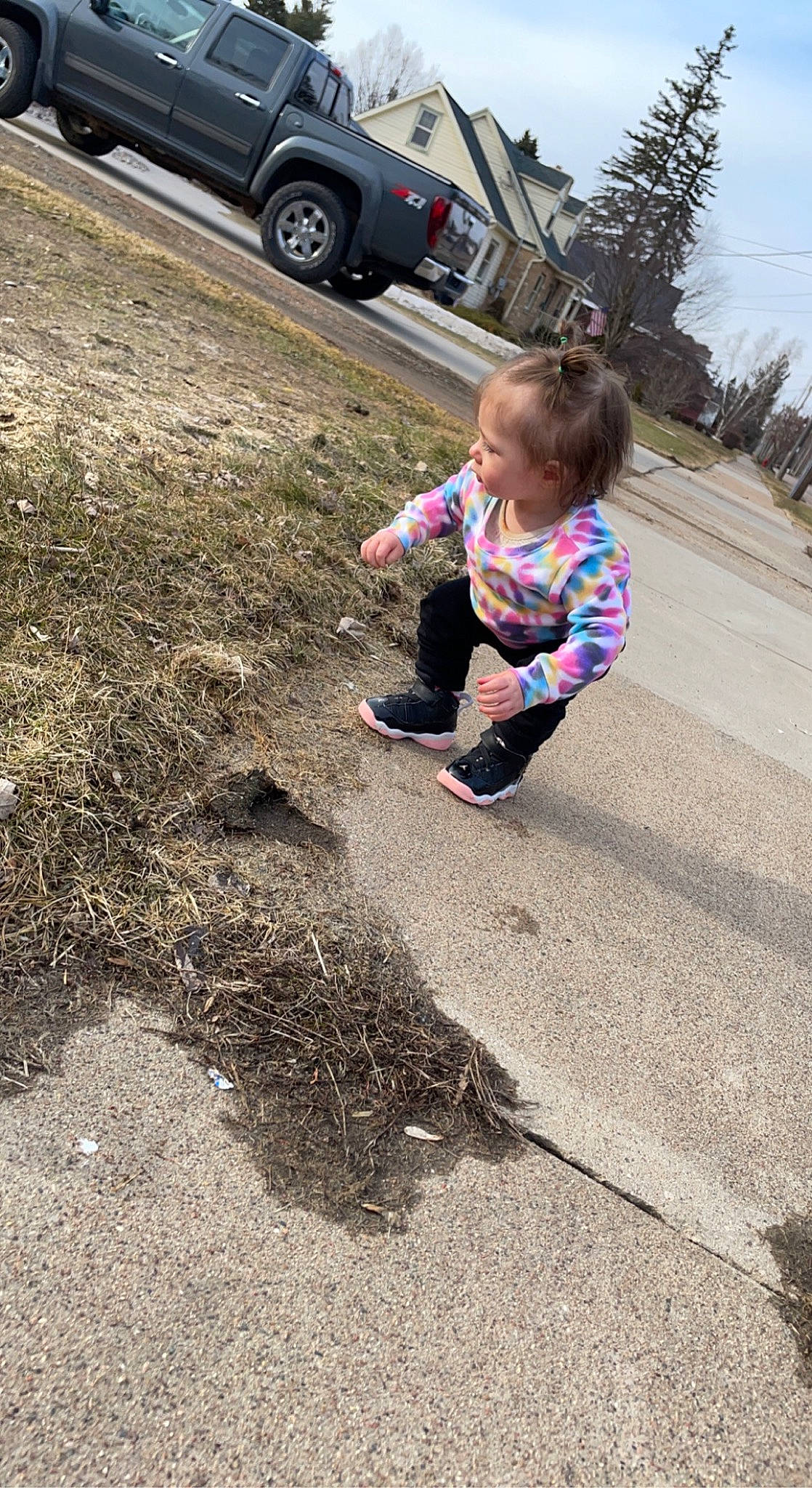 Aria joined the competition — help win amazing prizes! asphalt, automotive_tire, car, city, grass, landscape, person, plant, recreation, road, road_surface, sidewalk, sky, soil, tire, toddler, tree, truck, vehicle_door, wheel