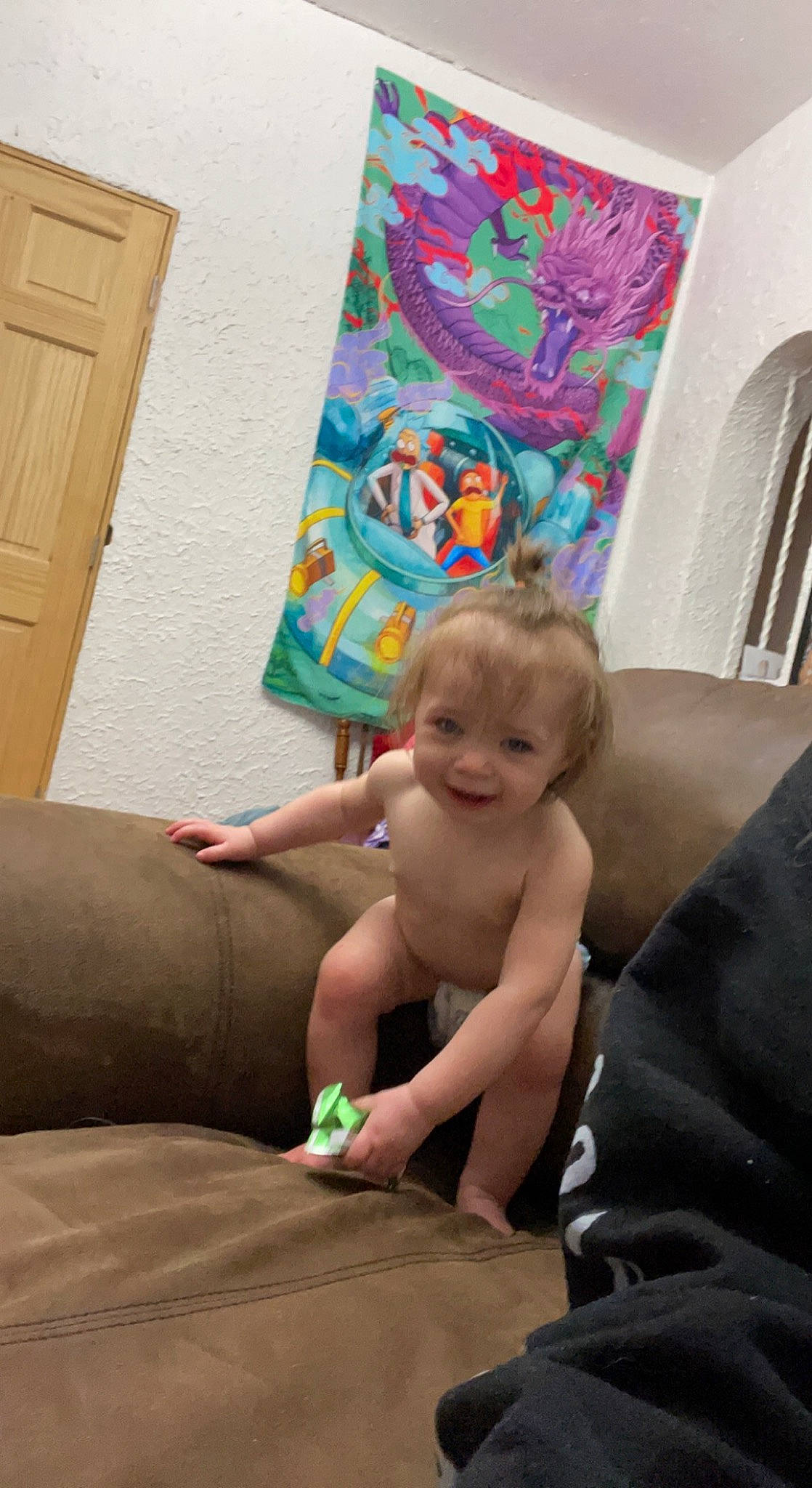 Aria joined the competition — help win amazing prizes! baby, child, comfort, couch, door, event, eye, finger, flooring, fun, human_body, human_leg, joy, lap, leg, living_room, person, picture_frame, sitting, smile