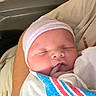 Wyatt joined the competition — help win amazing prizes! newborn, baby, sleeping, hospital, blanket, swaddled, knit_cap, pink, striped, portrait, face, eyes_closed, infant, cozy, bed, hospital_bedding, hand, indoors, peaceful, photography