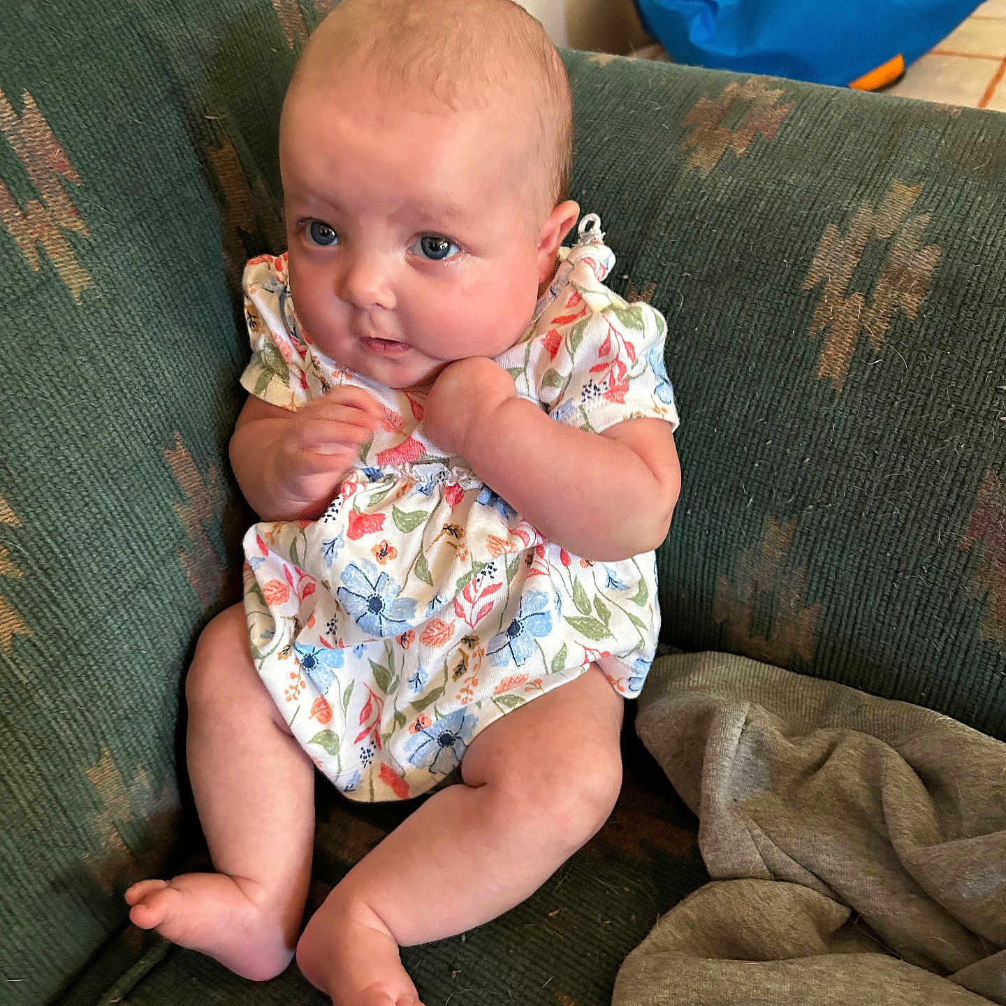 Lea is registered to the contest to win money with this photo: accessories, baby, bag, bodypart, couch, cushion, face, finger, furniture, hand, handbag, happy, head, homedecor, newborn, person, photography, portrait, sitting, smile