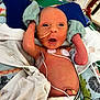 Luca James is registered to the contest to win money with this photo: newborn, baby, medical, hospital, nicu, feeding_tube, mittens, blanket, wires, diaper, premature, infant, healthcare, monitoring, cute, fragile, patient, lying_down, skin, care