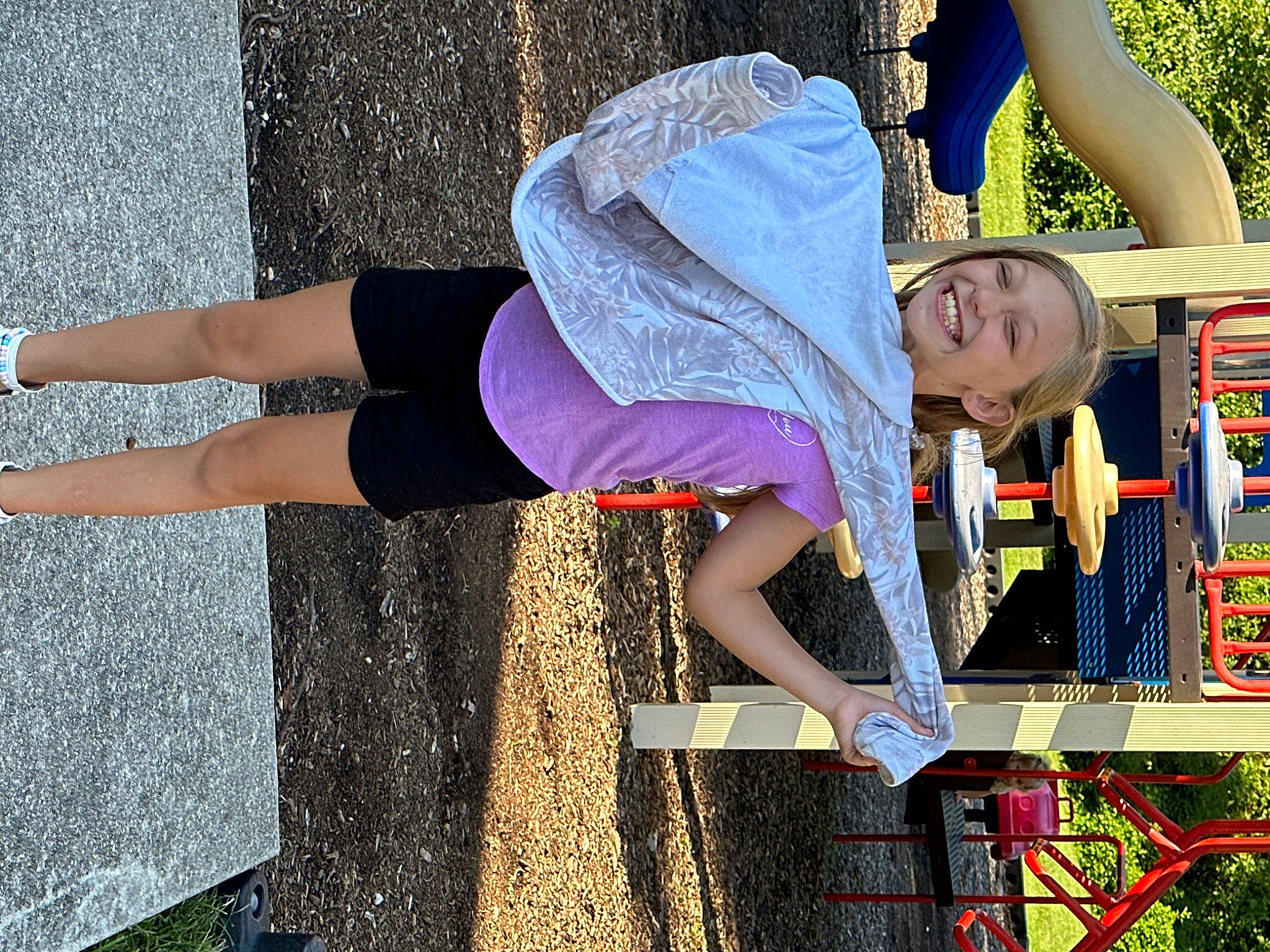 Bella joined the competition — help win amazing prizes! beauty, child, eyewear, fun, grass, happy, human, human_leg, joy, knee, leisure, magenta, people_in_nature, person, plant, recreation, sitting, t_shirt, textile, thigh