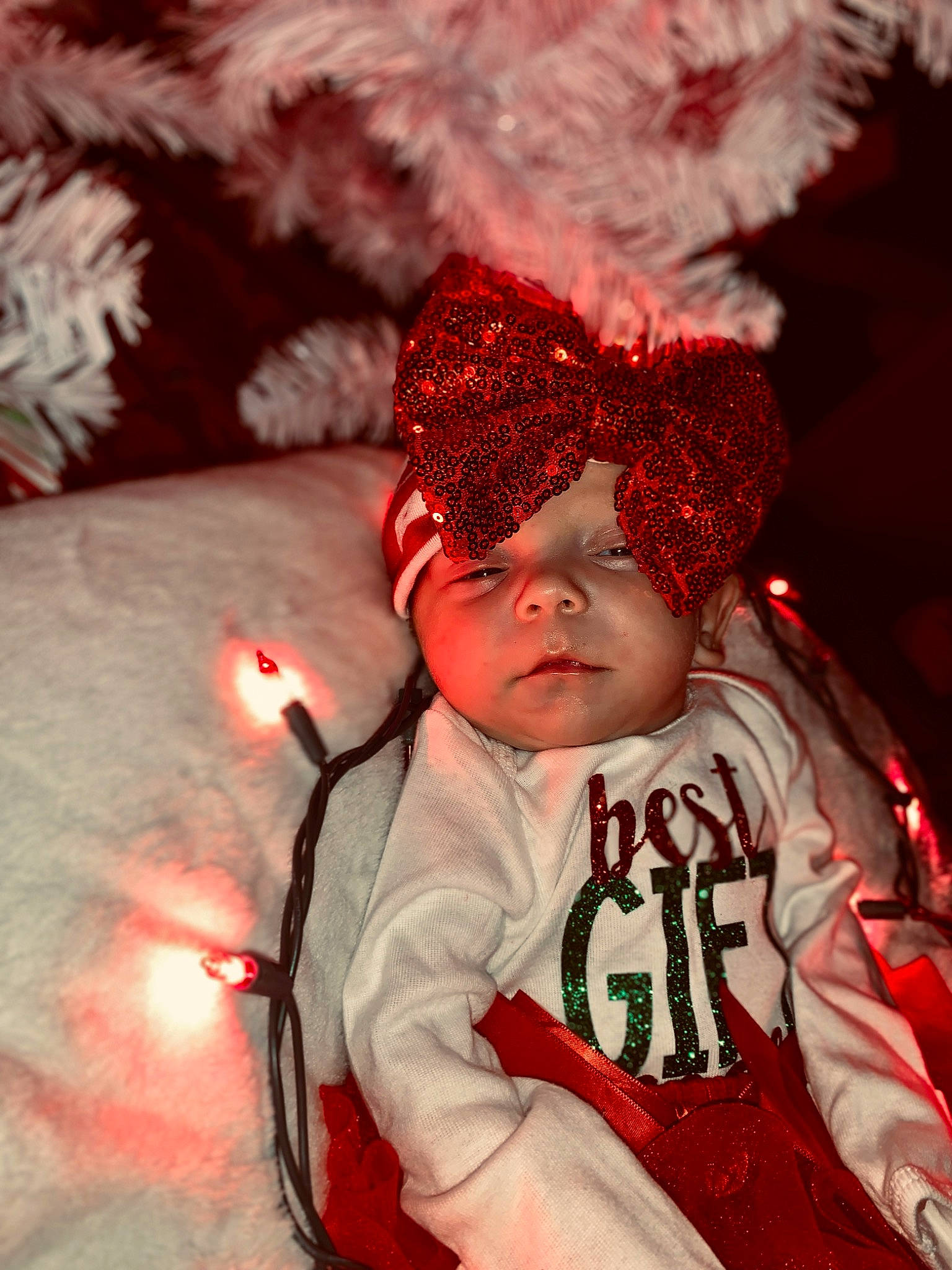 Zoee joined the competition — help win amazing prizes! baby, baby_toddler_clothing, beanie, cap, carmine, costume_hat, event, eye, flash_photography, freezing, fun, happy, headwear, holiday, human_body, knit_cap, light, person, red, snow