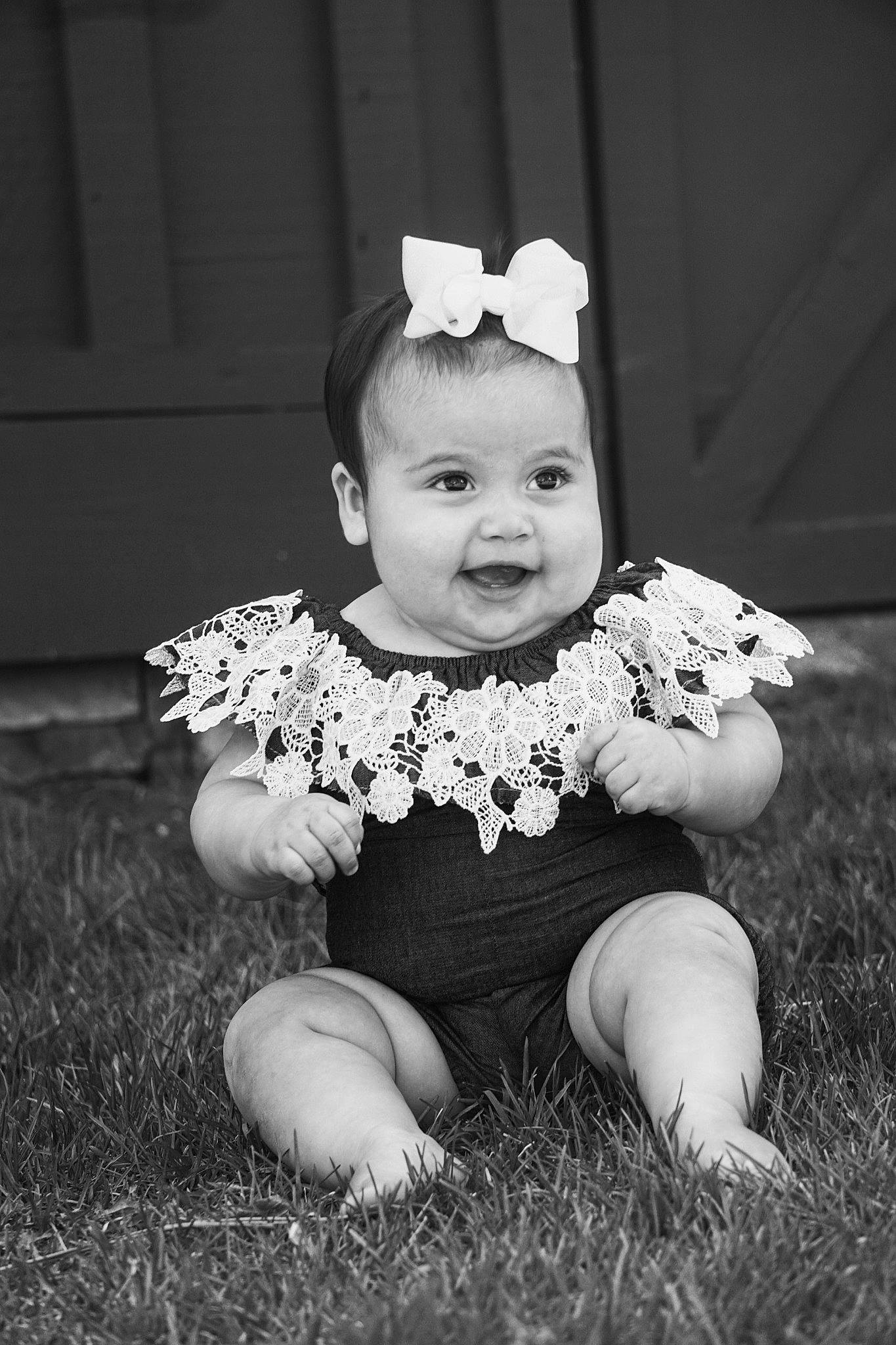 Sofia is registered to the contest to win money with this photo: art, baby, baby_toddler_clothing, black_and_white, child, face, flash_photography, fun, grass, happy, headband, headpiece, iris, jewellery, monochrome, monochrome_photography, person, sleeve, smile, style