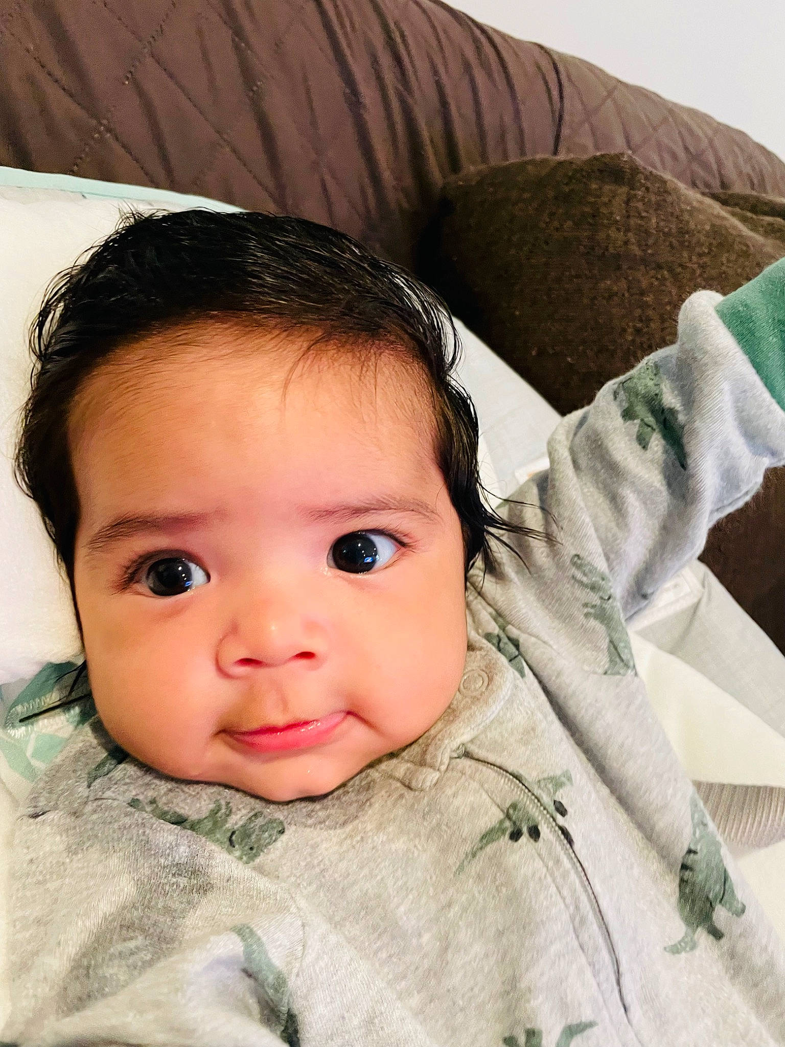 Evan is registered to the contest to win money with this photo: baby, baby_toddler_clothing, cheek, child, comfort, eye, eyelash, flash_photography, fur, happy, linens, lip, nose, person, portrait_photography, skin, sleeve, textile, toddler