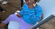 Rhyli is registered to the contest to win money with this photo: bread, chair, child, clothing, cream, eating, face, female, food, footwear, furniture, girl, happy, head, person, photography, portrait, shoe, sitting, smile