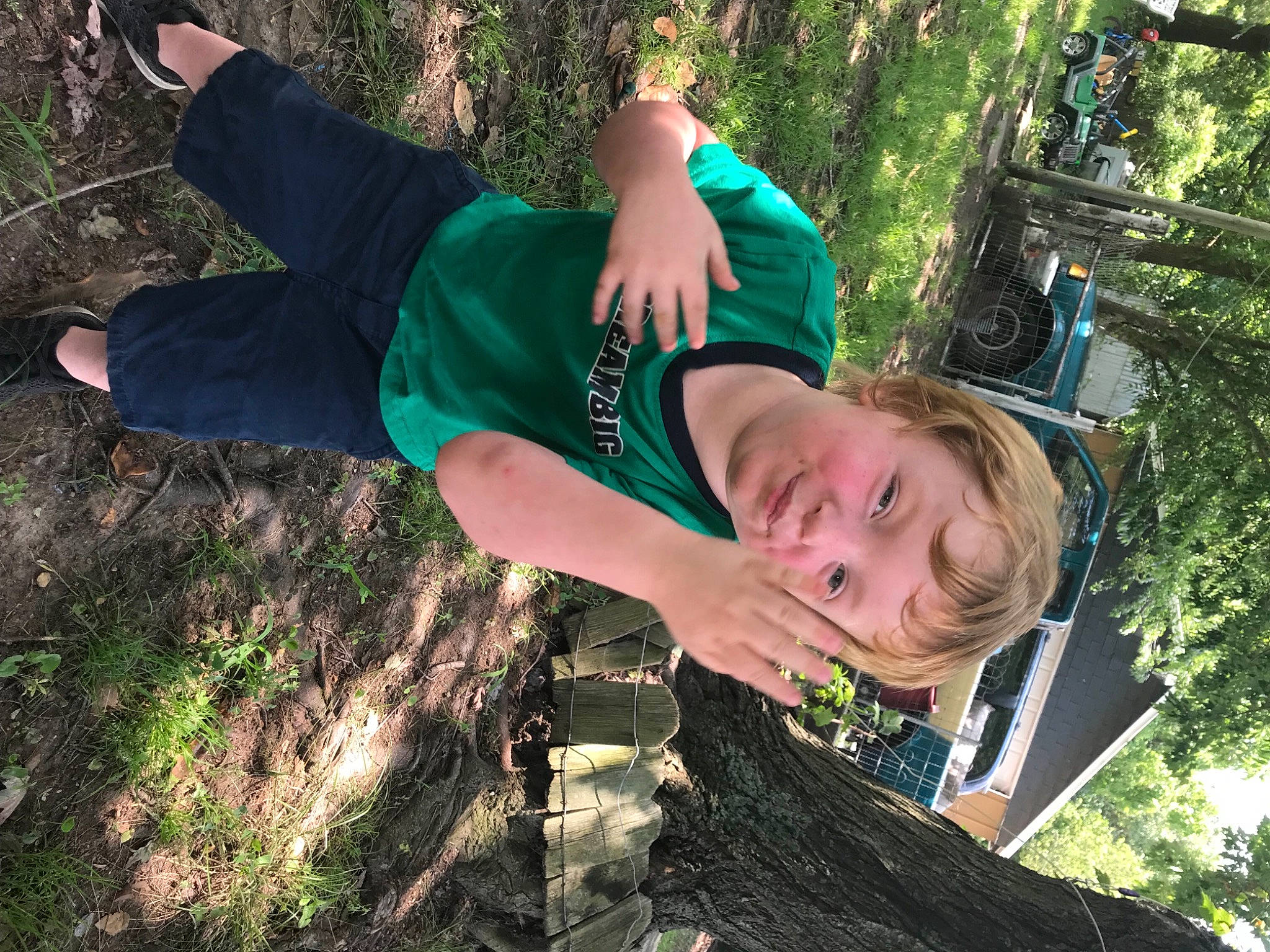 Clayton joined the competition — help win amazing prizes! electric_blue, forest, fun, grass, green, happy, knee, leisure, people_in_nature, person, plant, recreation, soil, sportswear, t_shirt, thigh, tree, trunk, wilderness, wood