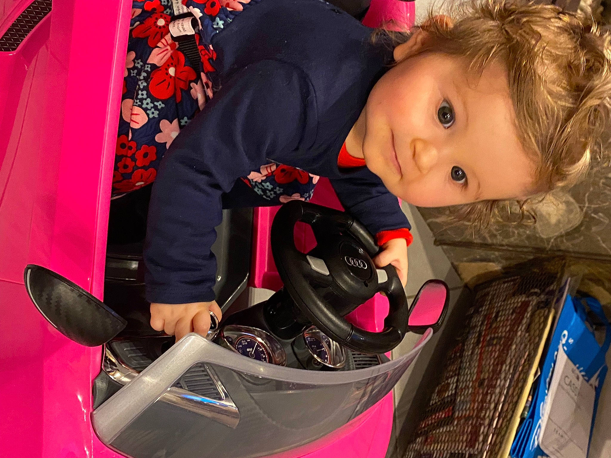 Lilas participe au concours pour gagner de l'argent avec cette photo : audio_equipment, auto_part, automotive_design, baby, baby_carriage, baby_products, bag, bumper, carmine, child, eyewear, fun, hood, magenta, motorcycle_helmet, person, personal_protective_equipment, pink, sitting, toddler
