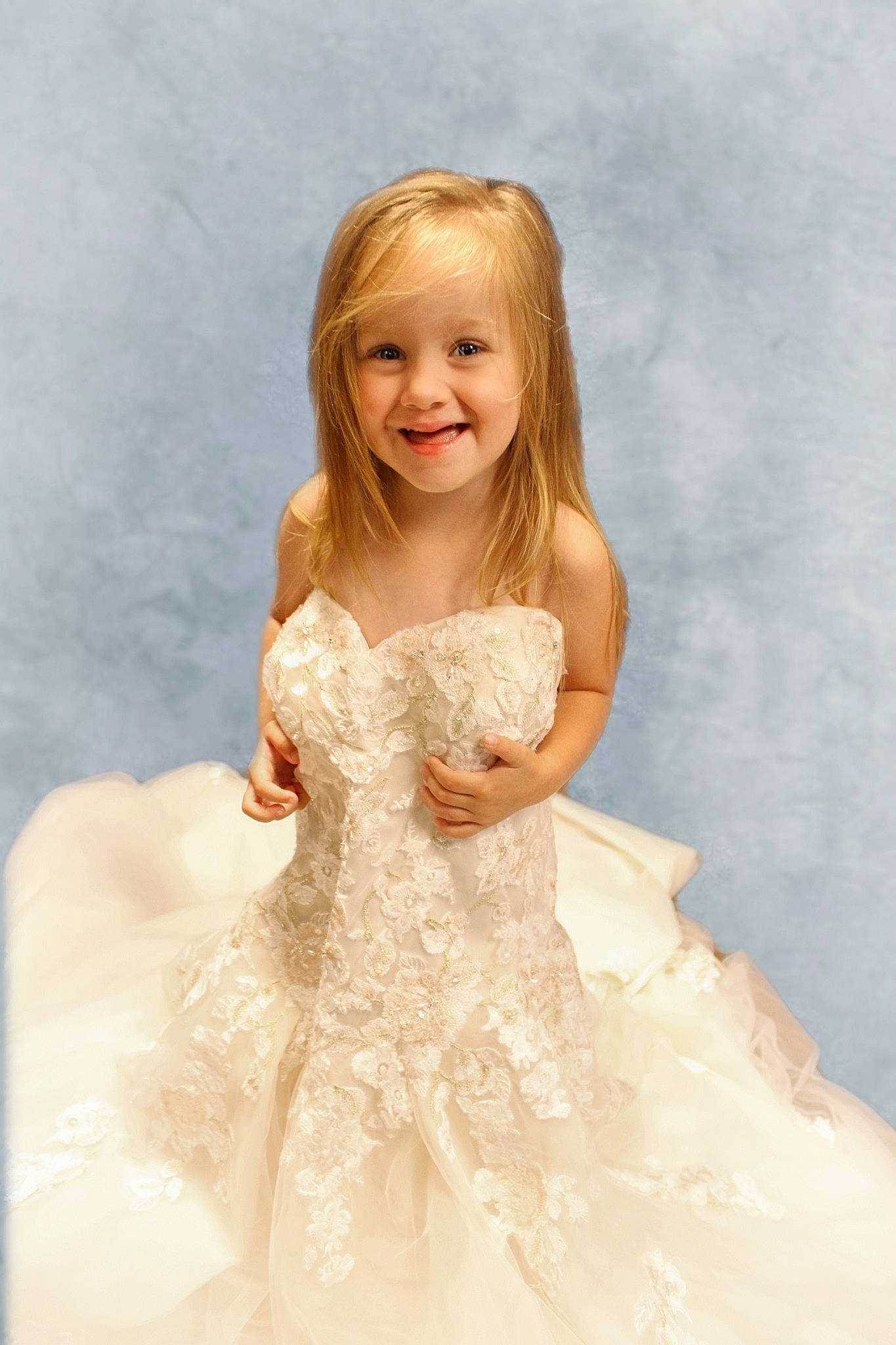 Madelyn is registered to the contest to win money with this photo: bridal_clothing, bridal_party_dress, day_dress, dress, embellishment, fashion_design, flash_photography, formal_wear, gown, happy, iris, joy, one_piece_garment, outerwear, person, shoulder, sleeve, smile, strapless_dress, waist