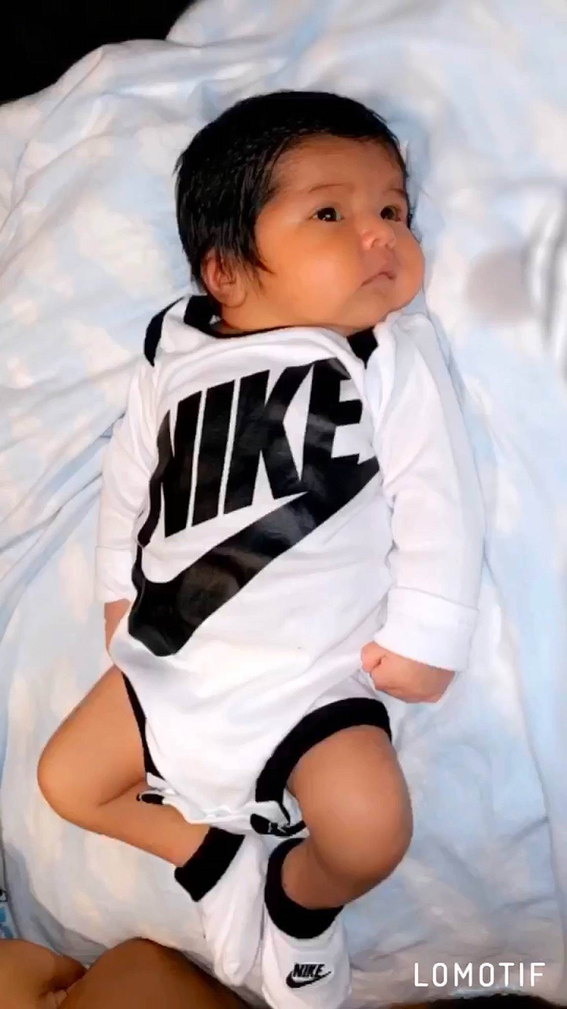 Joseph Pérez is registered to the contest to win money with this photo: arm, baby, baby_products, child, child_model, leg, outerwear, person, product, sleeve, toddler, uniform, white