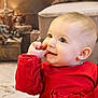 baby, child, christmas_tree, cozy, cute, decorations, face, furniture, happy, holiday, holiday_decor, indoor, infant, person, portrait, presents, red_dress, smiling, soft_lighting, young_child