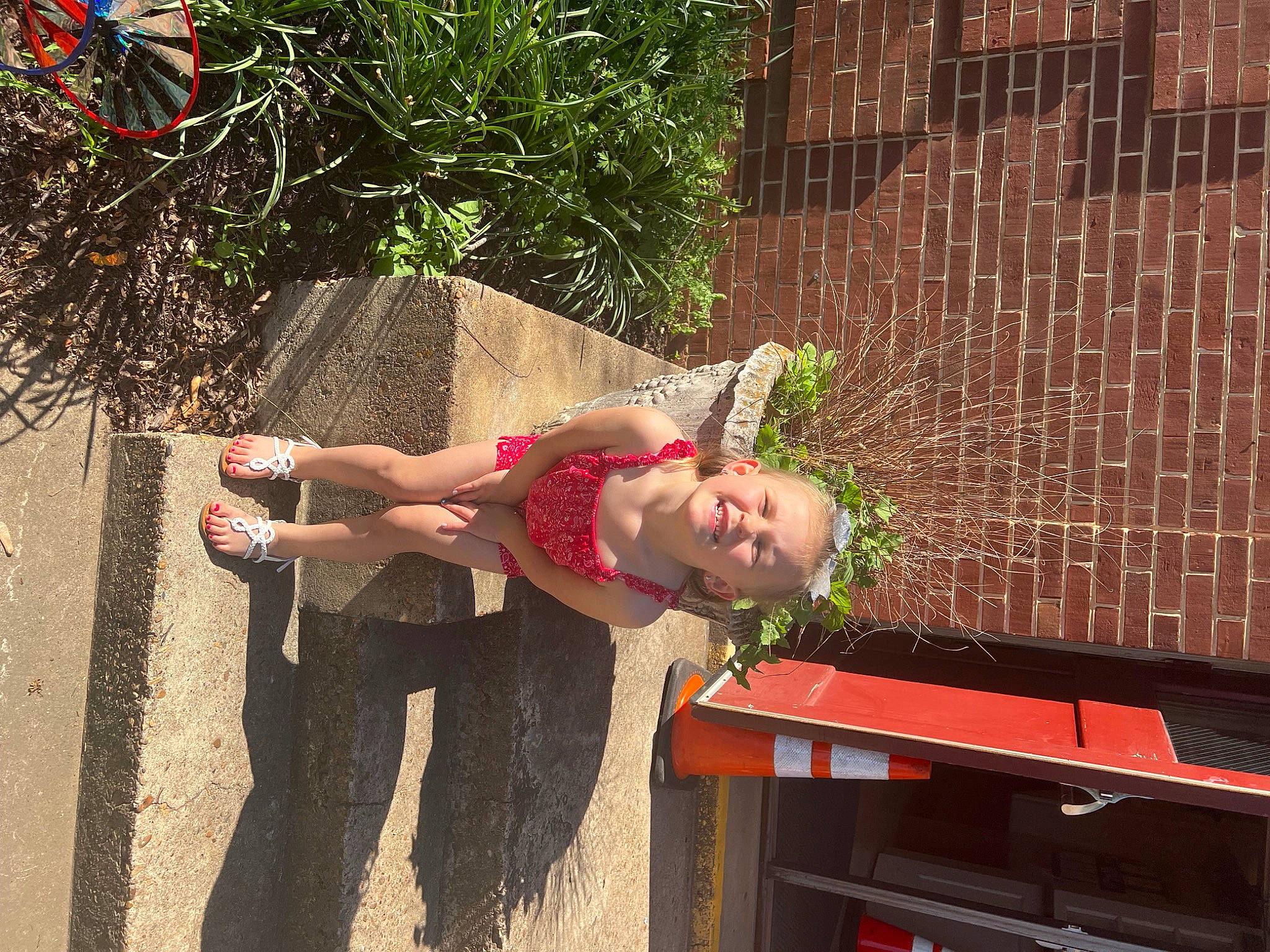 Alayna joined the competition — help win amazing prizes! brick, brickwork, child, fun, grass, human_leg, joy, leisure, magenta, person, plant, recreation, street, thigh, toddler, vacation, wood