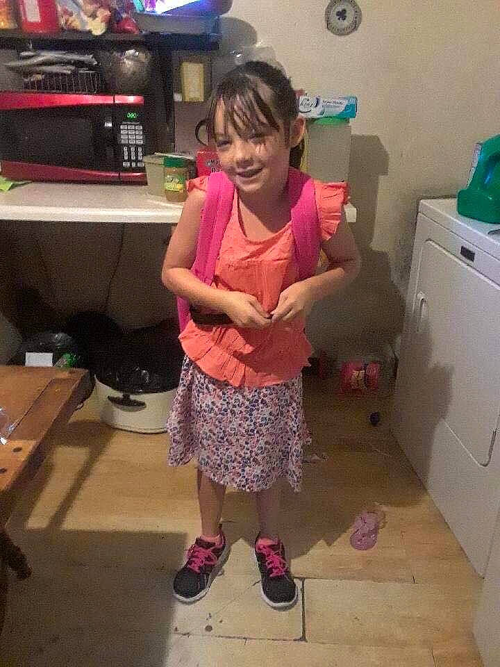 Keirra is registered to the contest to win money with this photo: arm, child, clothing, cool, day, finger, fun, girl, hair, hairstyle, joint, joy, leg, person, pink, play, product, shoulder, snapshot, standing