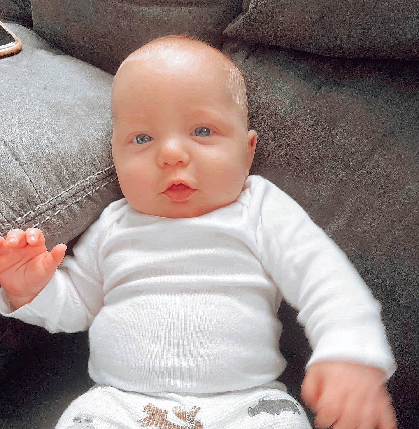 Kayson joined the competition — help win amazing prizes! baby, baby_toddler_clothing, cheek, chin, comfort, eye, face, finger, gesture, head, human_body, iris, linens, lip, mouth, nose, person, product, skin, sleeve