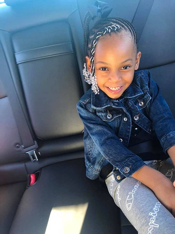 Keely is registered to the contest to win money with this photo: auto_part, black_hair, car, car_seat, child, child_model, cool, denim, family_car, jeans, joy, luxury_vehicle, person, seat_belt, sitting, smile, textile, toddler, vehicle, vehicle_door