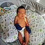 Adrian joined the competition — help win amazing prizes! baby, newborn, infant, mittens, diaper, pillow, owl_pattern, baby_bed, baby_bouncer, indoors, sunlight, face, expression, cute, child, resting, soft_fabric, comfort, small_hands, baby_legs