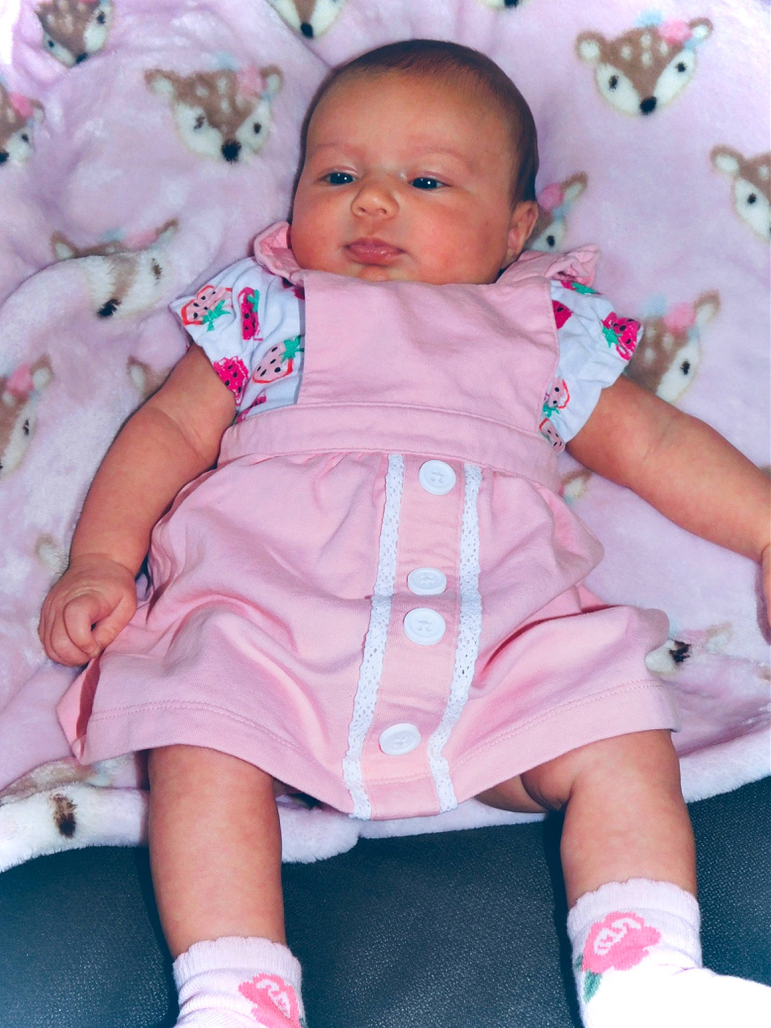 Willow is registered to the contest to win money with this photo: baby, baby_toddler_clothing, cheek, child, eye, face, facial_expression, happy, head, iris, magenta, mouth, organ, person, pink, purple, skin, sleeve, t_shirt, toddler