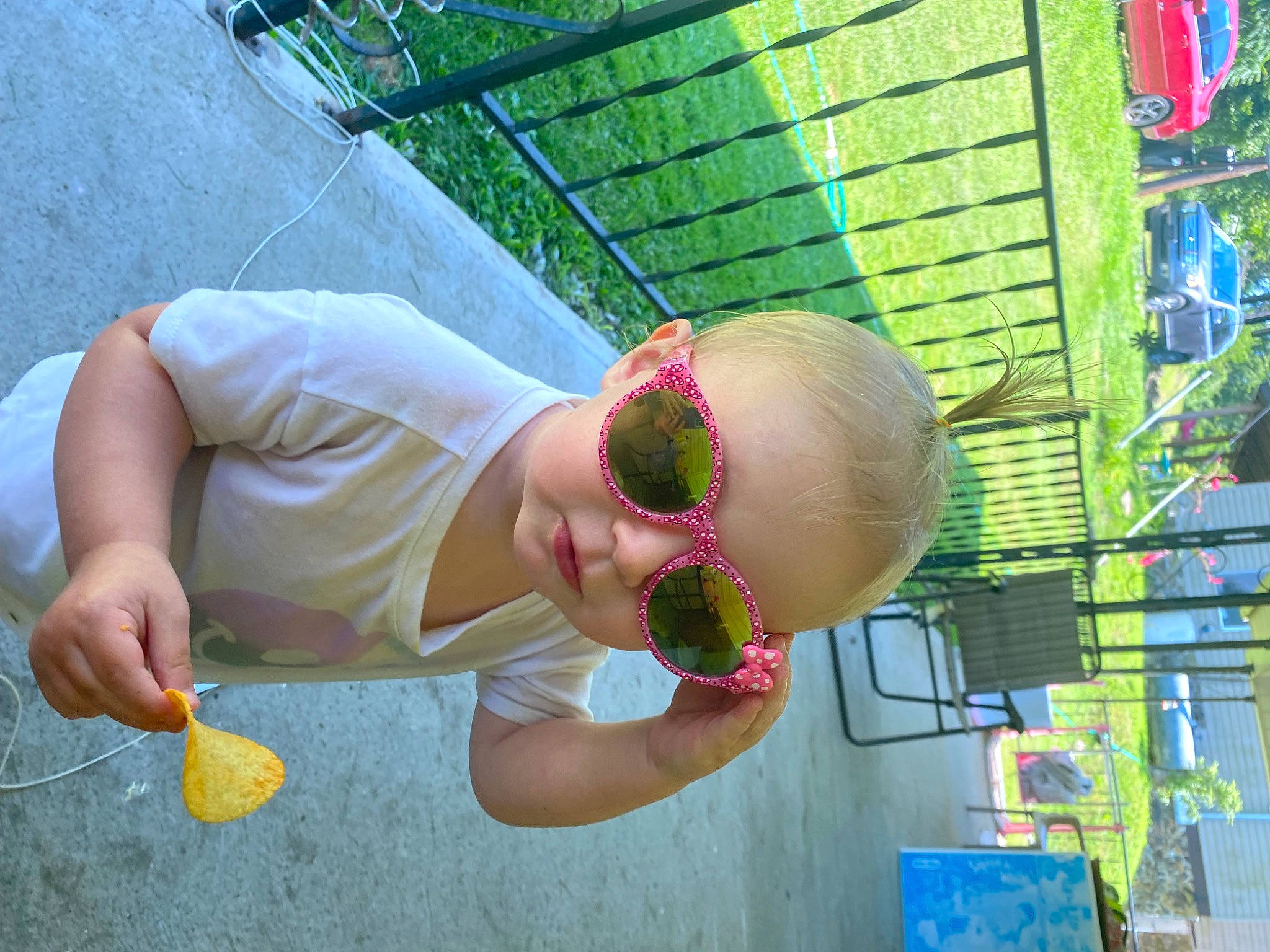Willow joined the competition — help win amazing prizes! baby, blue, child, eyewear, fun, glasses, goggles, grass, happy, leisure, magenta, person, plant, play, recreation, smile, sunglasses, toddler, tree, vacation