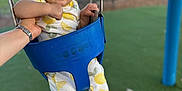 Antonella joined the competition — help win amazing prizes! baby, child, swing, playground, green_bow, lemon_pattern, outdoor, happy, smiling, hand_support, blue_swing, feet, infant, park, cute, headband, person, clothing, daylight, grass