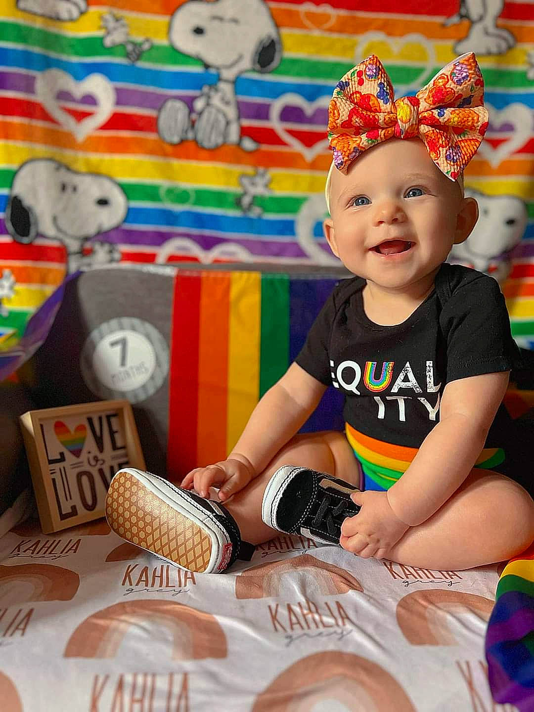 Kahlia joined the competition — help win amazing prizes! baby, baby_toddler_clothing, cap, child, event, fashion_accessory, fun, happy, hat, headwear, holiday, joy, leisure, orange, person, play, product, room, shorts, smile
