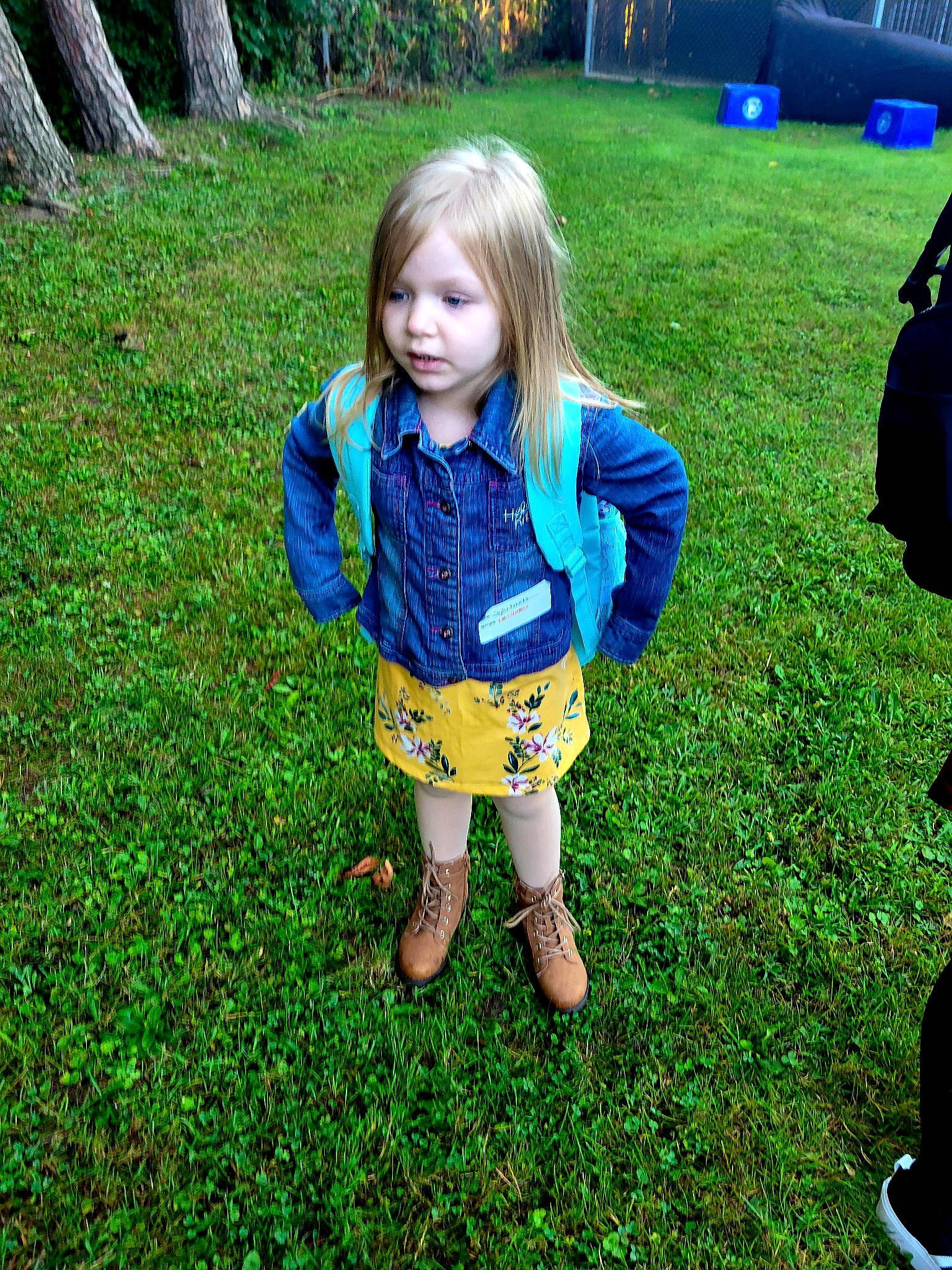 Sylvi is registered to the contest to win money with this photo: baby_toddler_clothing, bag, child, electric_blue, fun, grass, grassland, green, happy, lawn, leaf, leisure, luggage_and_bags, meadow, nature, people_in_nature, person, plant, recreation, shoe