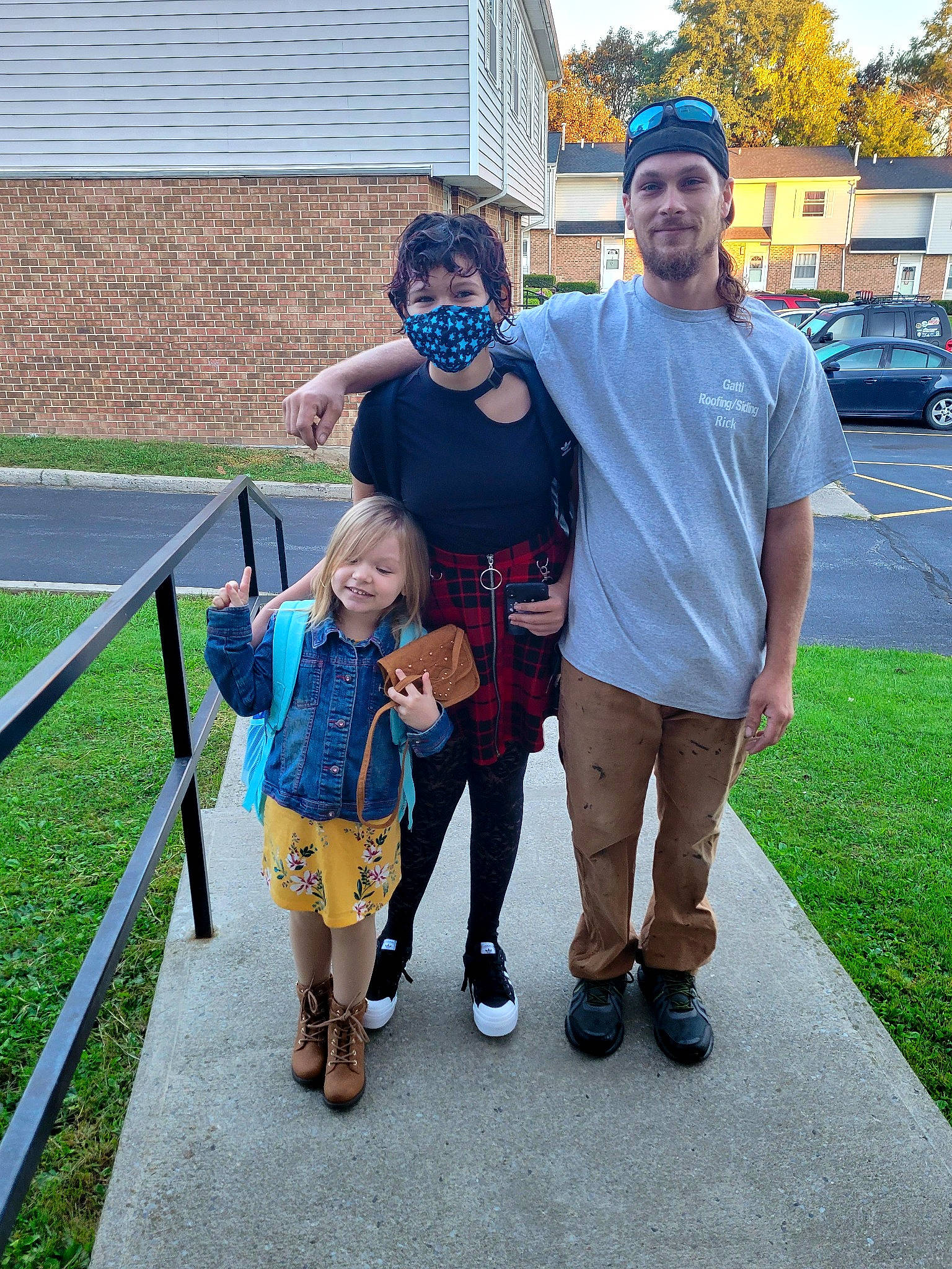 Sylvi is registered to the contest to win money with this photo: boot, electric_blue, event, footwear, fun, grass, happy, headwear, joy, leg, leisure, person, public_space, recreation, shoe, sidewalk, smile, sneakers, standing, sunglasses