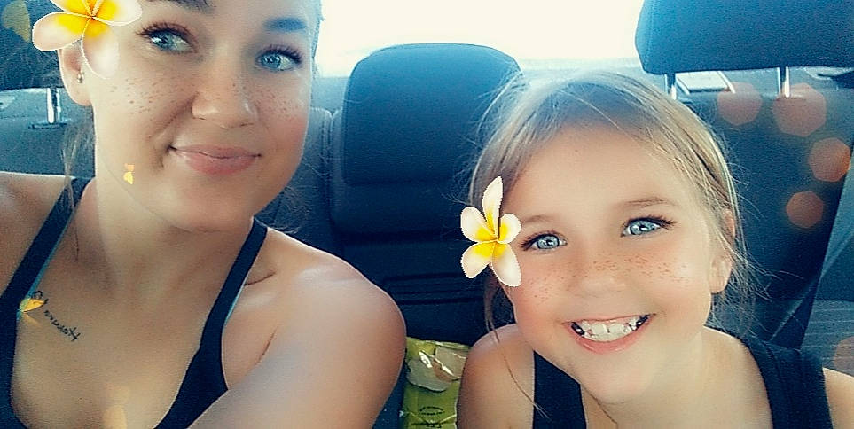 Charlotte is registered to the contest to win money with this photo: black_hair, cool, eyebrow, eyelash, face, facial_expression, flash_photography, flower, fun, gesture, happy, iris, joy, lip, morning, mouth, nose, person, petal, skin