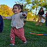 Emma joined the competition — help win amazing prizes! toddler, child, outdoor, park, grass, walking, standing, smiling, happy, portrait, playful, autumn, trees, hula_hoop, sweater, pants, shoes, family, daylight, photography