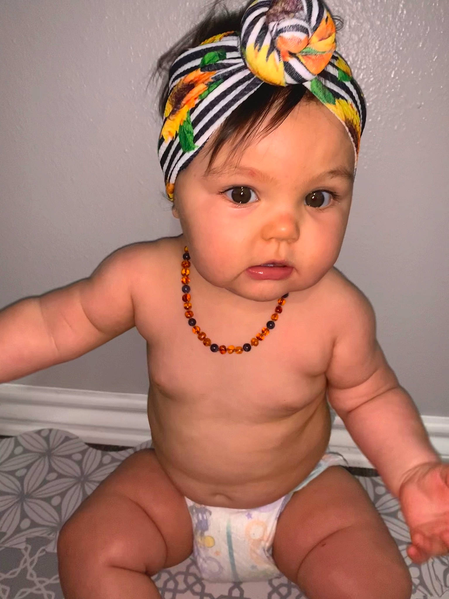 Ensley joined the competition — help win amazing prizes! baby, baby_bloomers, baby_products, baby_toddler_clothing, cheek, chest, child, clothing, diaper, fashion_accessory, hair_accessory, headband, headgear, headpiece, headwear, person, toddler