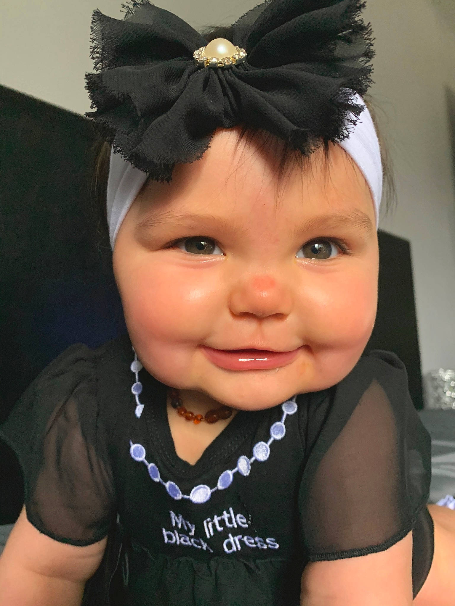 Ensley joined the competition — help win amazing prizes! baby, black_hair, cheek, child, ear, face, fashion_accessory, forehead, hair, hair_accessory, head, headband, headgear, headpiece, headwear, person, toddler