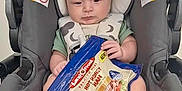 Thomas joined the competition — help win amazing prizes! baby, stroller, infant, package, ham, food, gray, seat, child, clothing, foot, hand, grocery, indoor, person, product, container, cute, holding, young