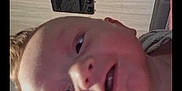Thomas is registered to the contest to win money with this photo: baby, blanket, blinds, candid, cheeks, child, closeup, face, furniture, happy, head, indoor, infant, pillow, portrait, room, skin, sleeper, smiling, toy