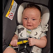 Thomas joined the competition — help win amazing prizes! baby, car_seat, child, infant, crayon, smile, seat_belt, safety, cute, face, hand, foot, clothing, indoors, child_safety, infant_seat, portrait, happy, young_child, seat