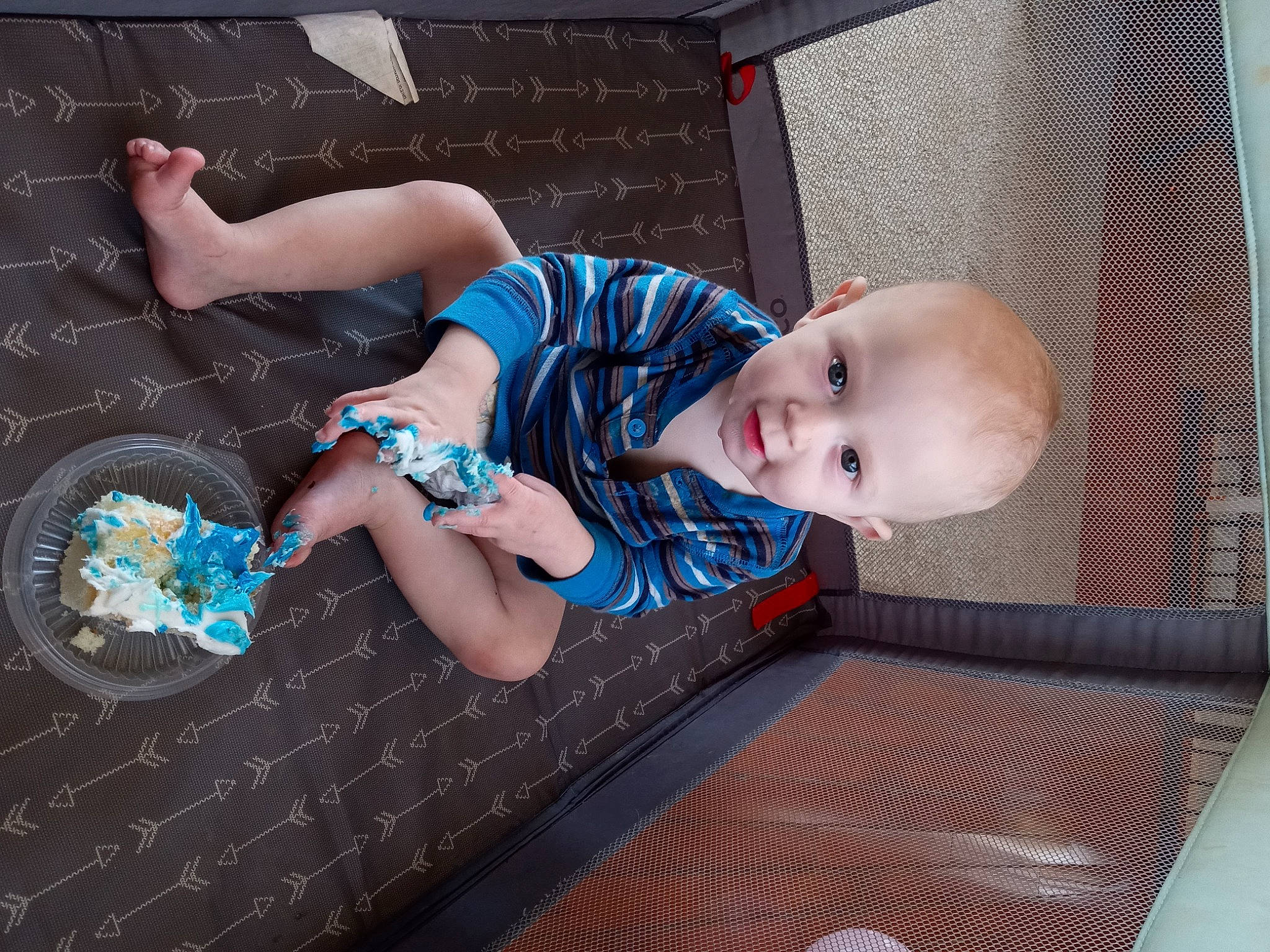 George is registered to the contest to win money with this photo: baby, baby_products, baby_toddler_clothing, barefoot, child, comfort, electric_blue, flash_photography, flooring, foot, fun, human_leg, leg, pattern, person, sitting, sock, thigh, toddler, wood