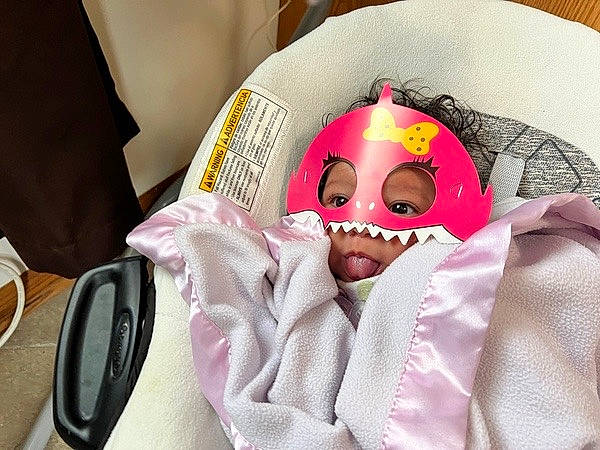 Avianna is registered to the contest to win money with this photo: audio_equipment, baby, baby_sleeping, bedding, blanket, carmine, child, comfort, eyelash, eyewear, fashion_accessory, linens, magenta, pattern, person, personal_protective_equipment, room, sleeve