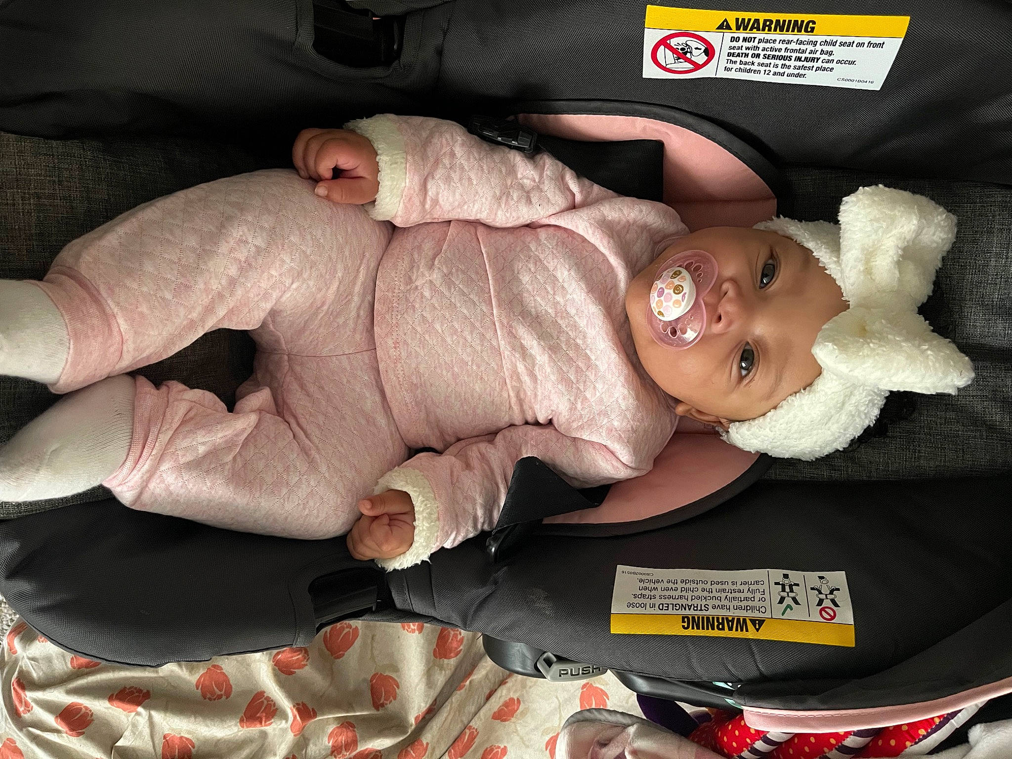 Alaia joined the competition — help win amazing prizes! abdomen, baby, baby_carriage, baby_products, baby_toddler_clothing, car_seat, child, comfort, family_car, finger, flesh, gesture, headwear, linens, mouth, person, room, smile, thumb, toddler