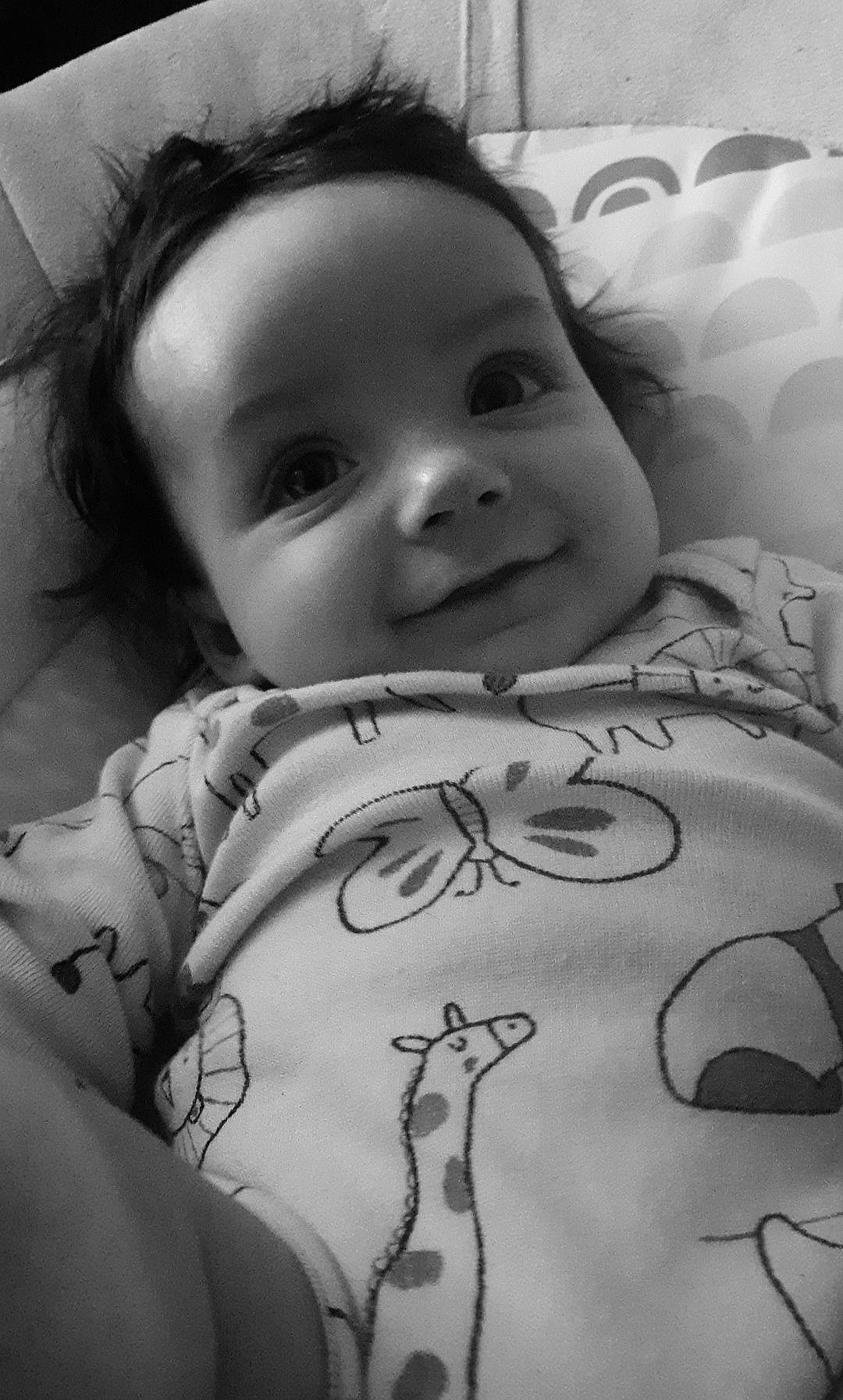 Charlotte is registered to the contest to win money with this photo: black_and_white, cheek, comfort, eye, eyebrow, face, facial_expression, flash_photography, gesture, happy, human, joy, mammal, mouth, organ, person, product, skin, smile, standing