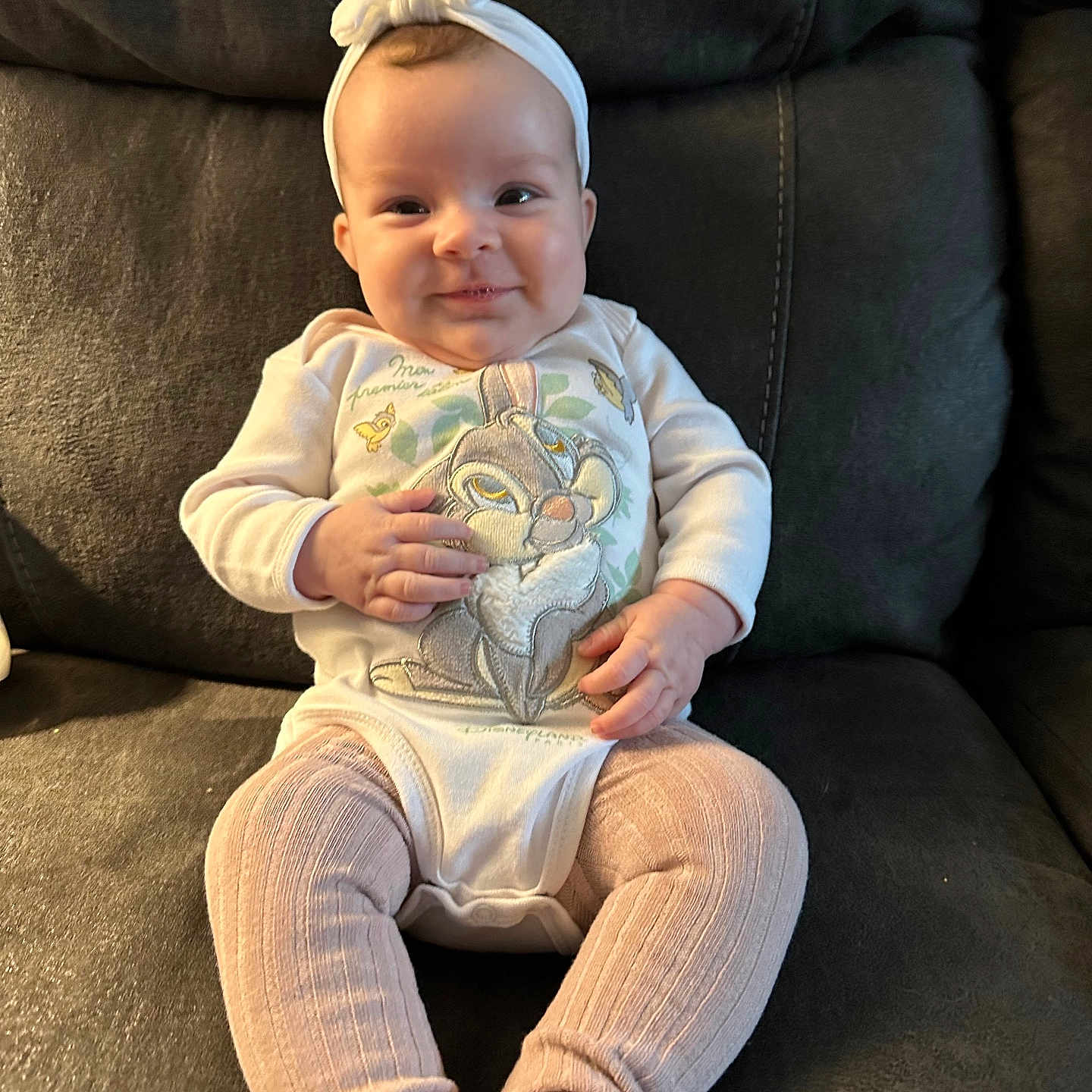 Evelyn joined the competition — help win amazing prizes! baby, bodypart, clothing, couch, cushion, face, finger, furniture, hand, happy, head, homedecor, jeans, pants, person, photography, portrait, sitting, sleeve, smile
